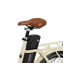 OneSport OT16 Pro, gros plan sur la selle marron, la tige de selle suspendue et la batterie noire