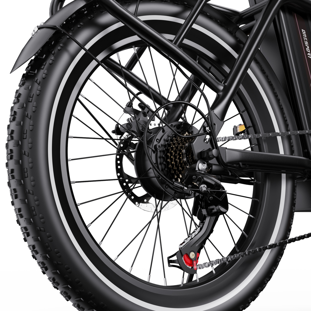 Roue arrière du OneSport OT16 Pro vue de côté avec frein à disque, cassette, chaîne et dérailleur