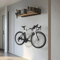 Support mural intelligent pour vélo avec un vélo au mur dans une entrée